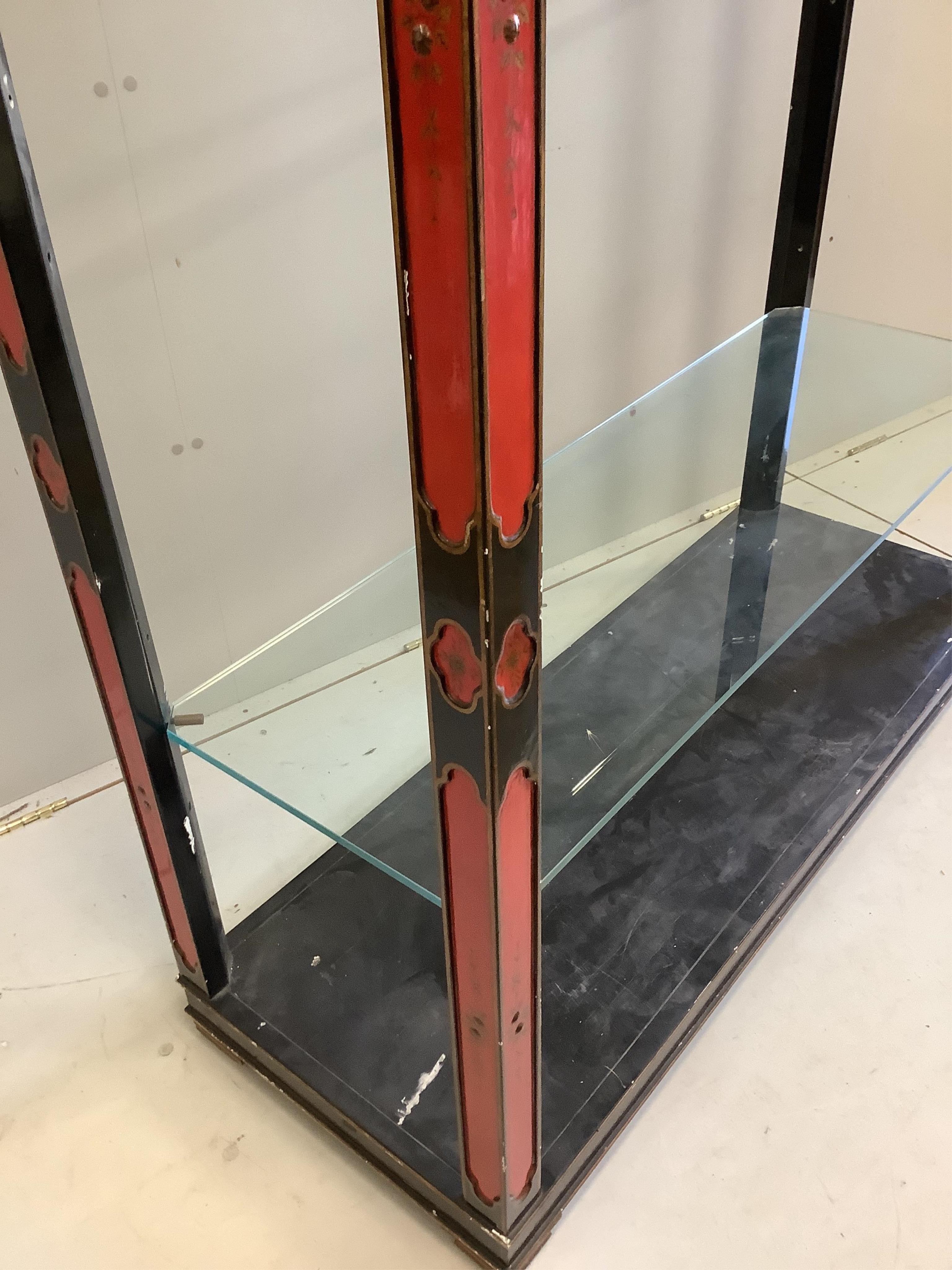 A chinoiserie lacquer open shelf unit, width 133cm, depth 49cm, height 214cm. Condition - fair